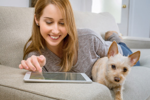 Dog and computer tablet